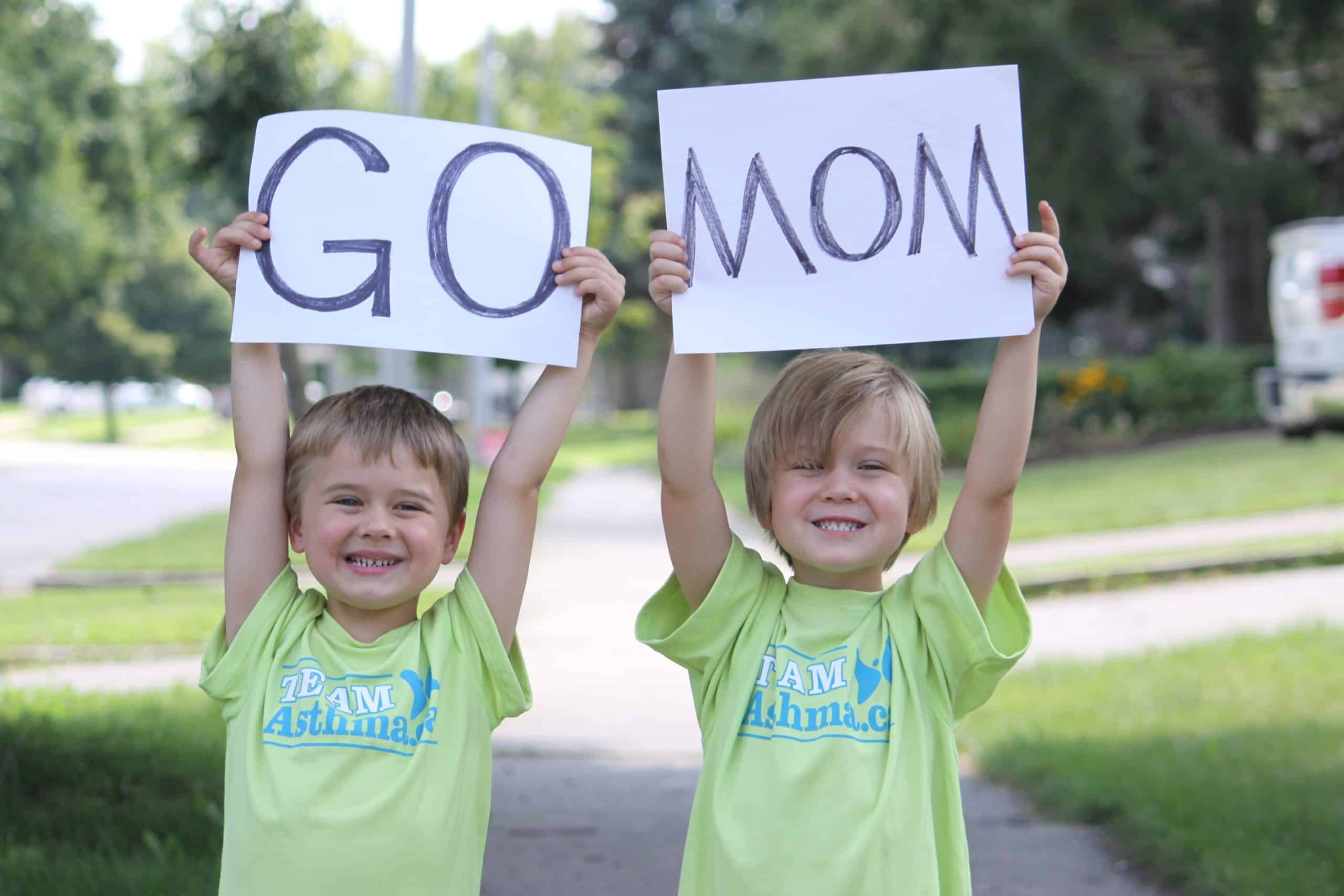 Ange's boys STWM Two boys holding up a Go Mom Sign and wearing Team Asthma T-shirts - Host your own fundraiser image